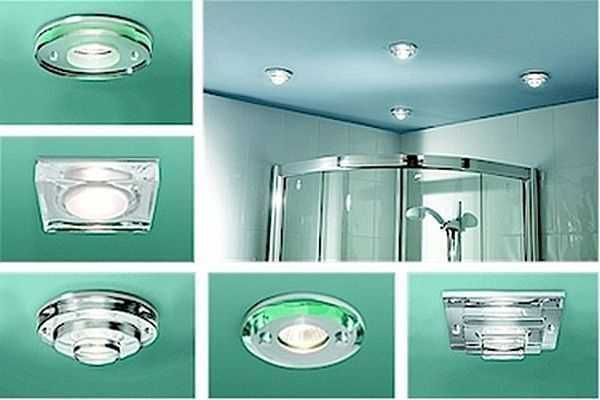 Освещение в ванной комнате с натяжным потолком: варианты без люстры, с точечными светильниками
 - 23 фото