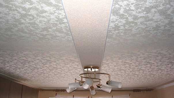 Какой натяжной потолок лучше выбрать: тканевый или пвх